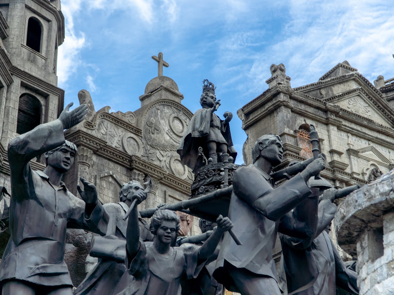 Detailed statues and architecture of the Heritage Monument in Cebu City, depicting historical events in the Philippines.